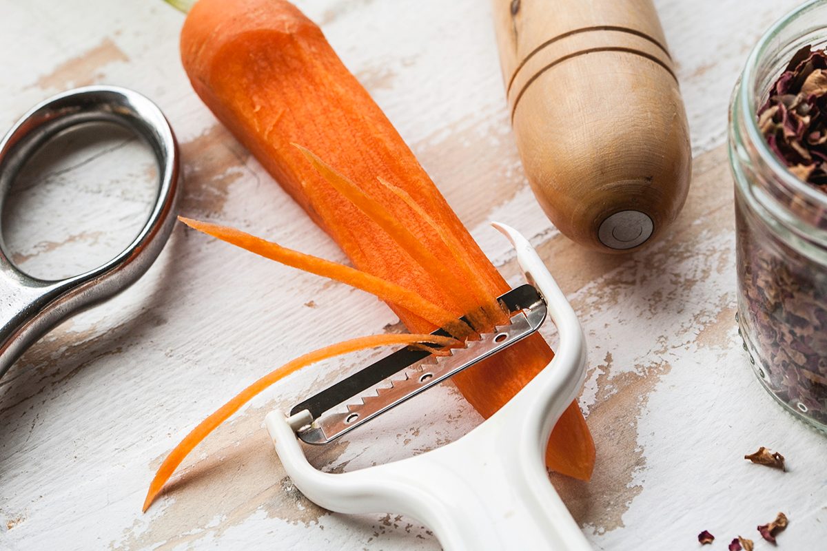 Kitchen Tools In Use, Julienne Slicing A Carrot