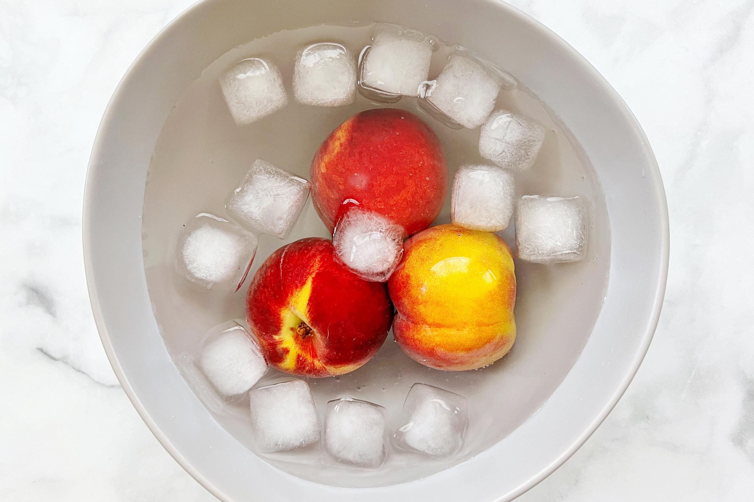 Peaches Blanching In Ice Water Bath
