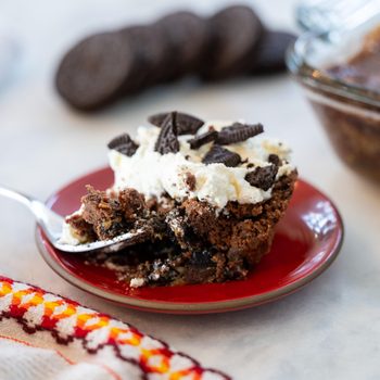 oreo dump cake on a red plate