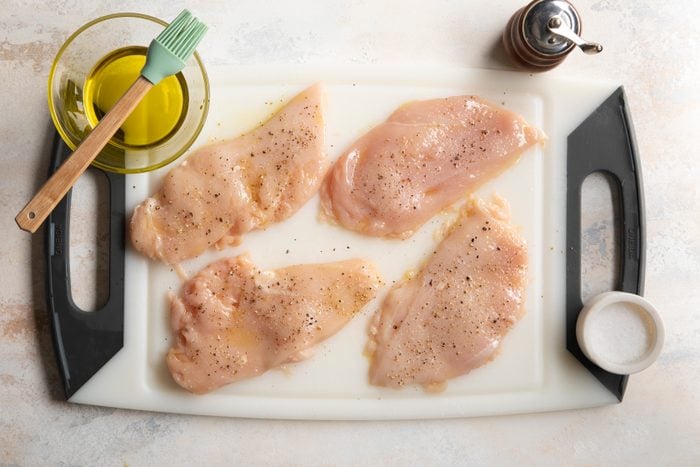 Asiago Tortelloni Alfredo with Grilled Chicken brushed with oil