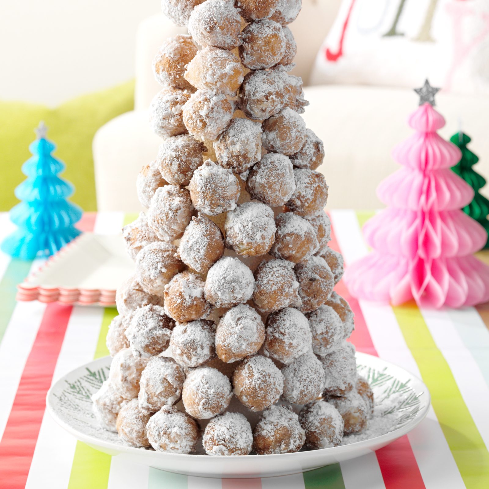 stacked donut bites in a cone shape