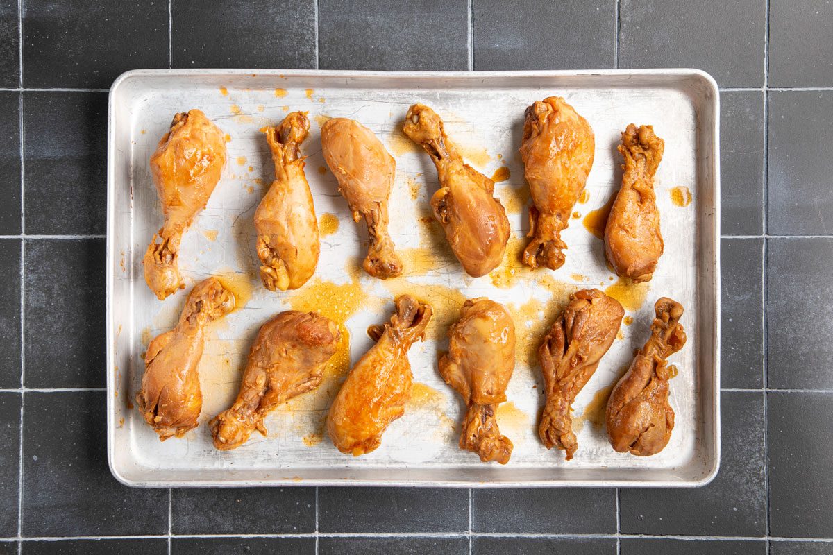 drumsticks spread out on a pan