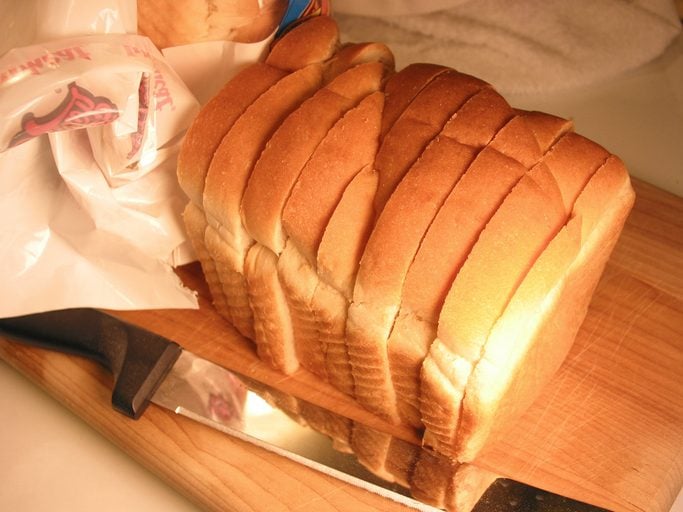 Loaf of bread on cutting board