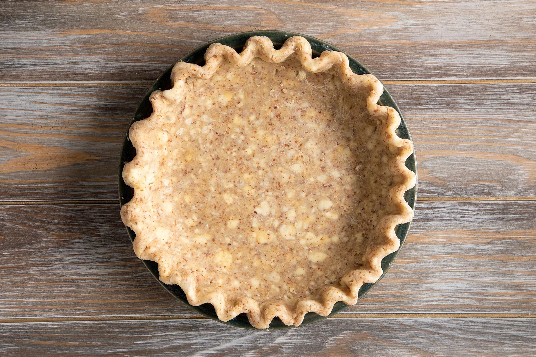 Fluted pan with pie flattened