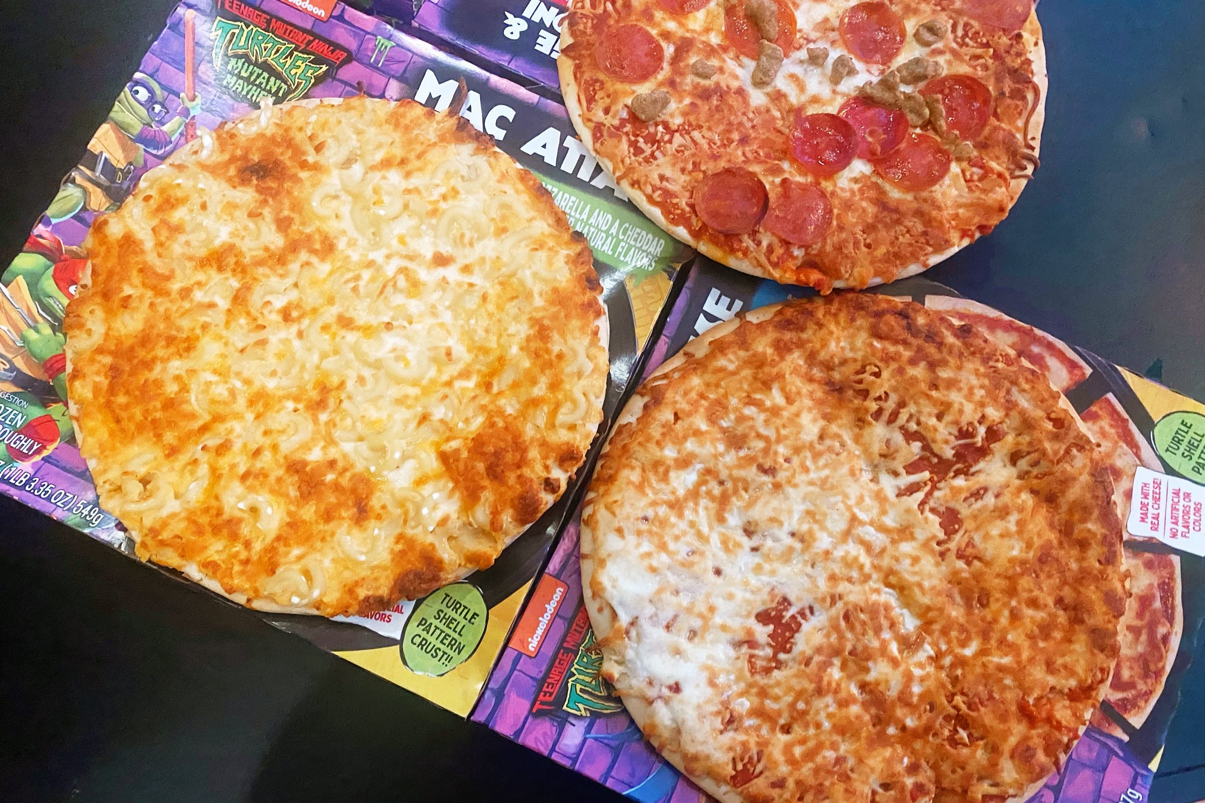 3 Teenage Mutant Ninja Turtle Pizzas on the boxes