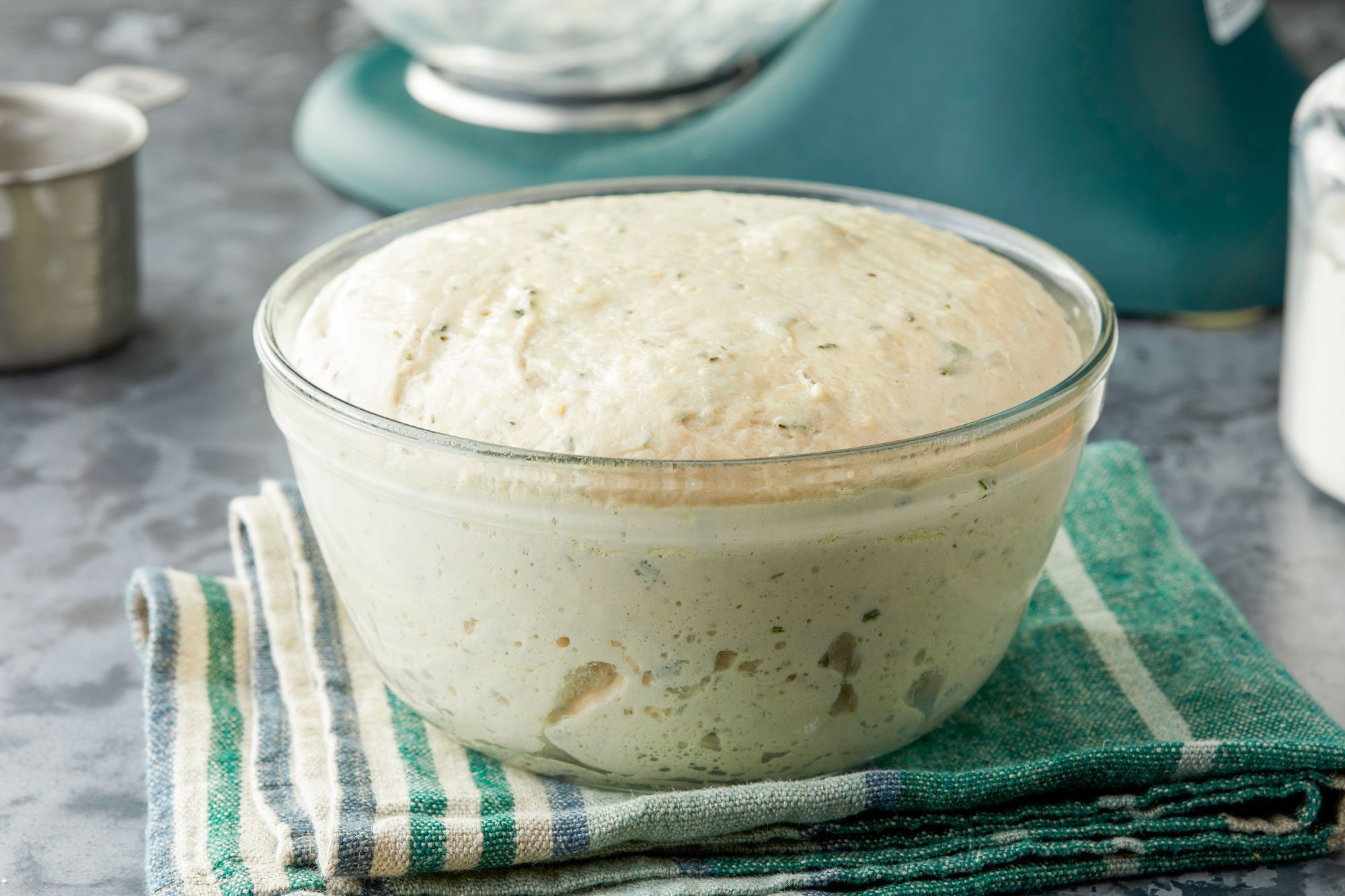 Fougasse Dough in a Glass Bowl on a Piece of Cloth