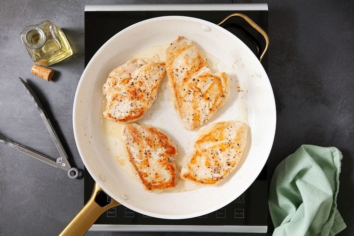 Browning chicken breast in skillet