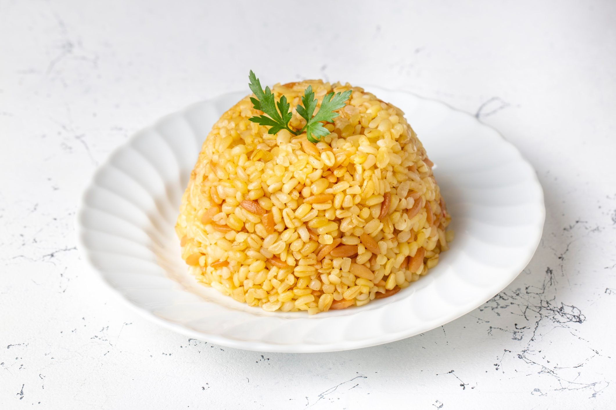Traditional delicious Turkish food, bulgur pilaf with vermicelli (Turkish name; arpa sehriyeli bulgur pilavi)