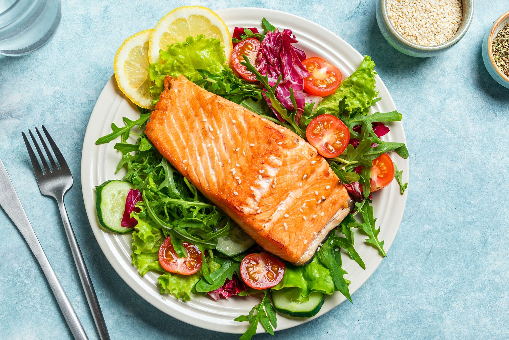 Grilled Salmon Fish Fillet And Fresh Vegetable Salad With Tomato Lettuce Arugula
