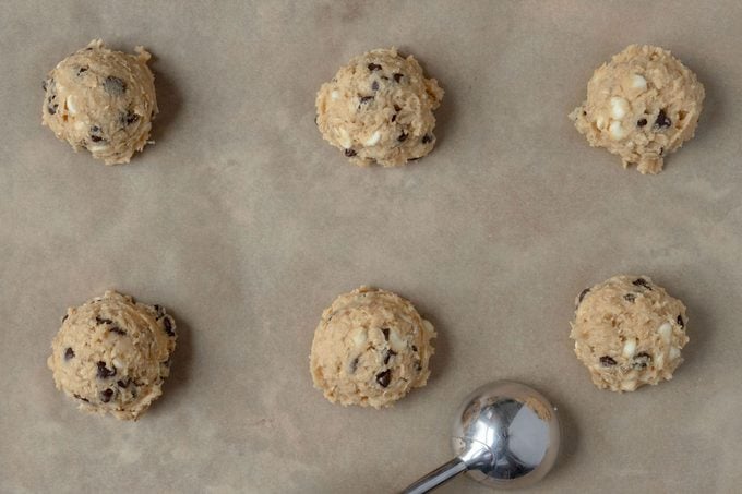 Scoops of dough on baking sheet