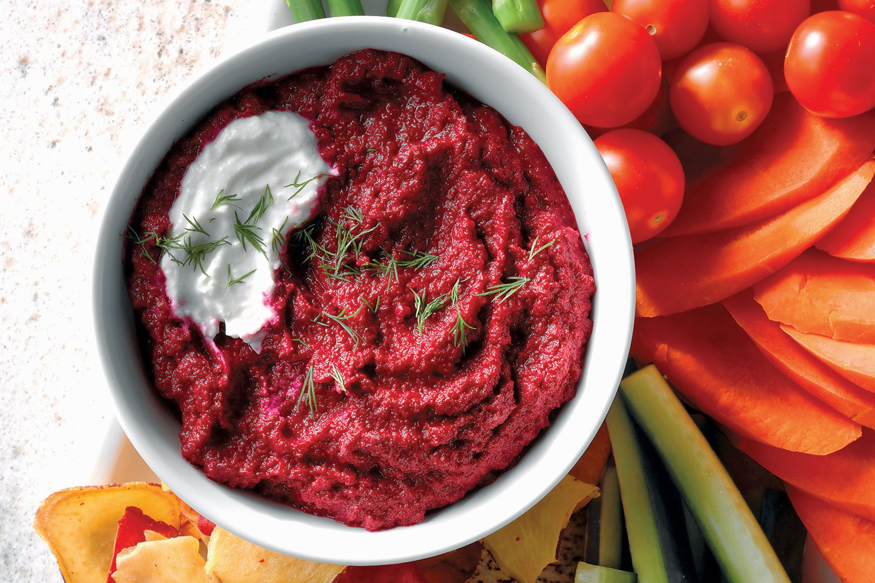 Roasted Beetroot And Garlic in a bowl on vegetables