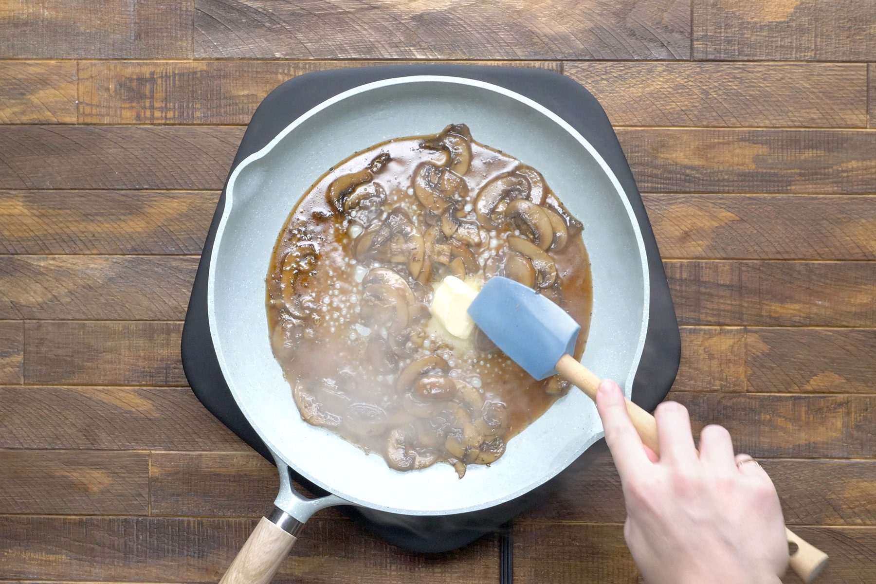 Adding Butter in mushrooms