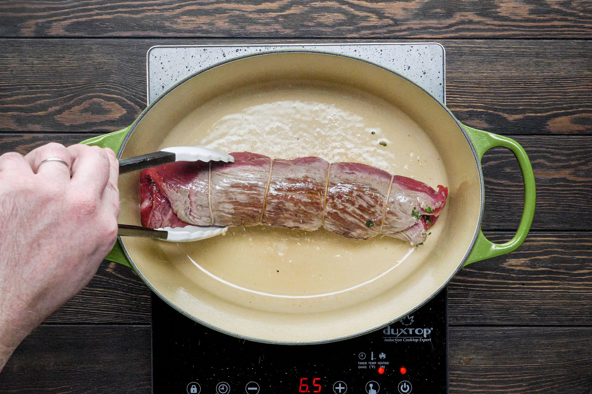 Brown the steak in dutch oven from all sides with the remaining oil