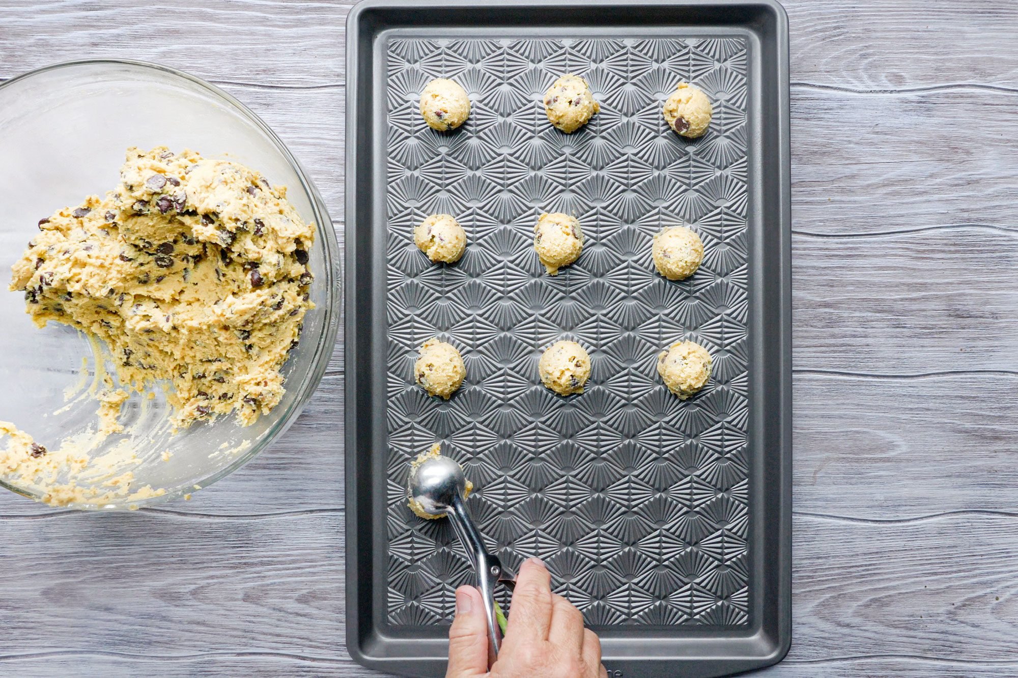 Drop the cookie dough two inches apart in baking tray