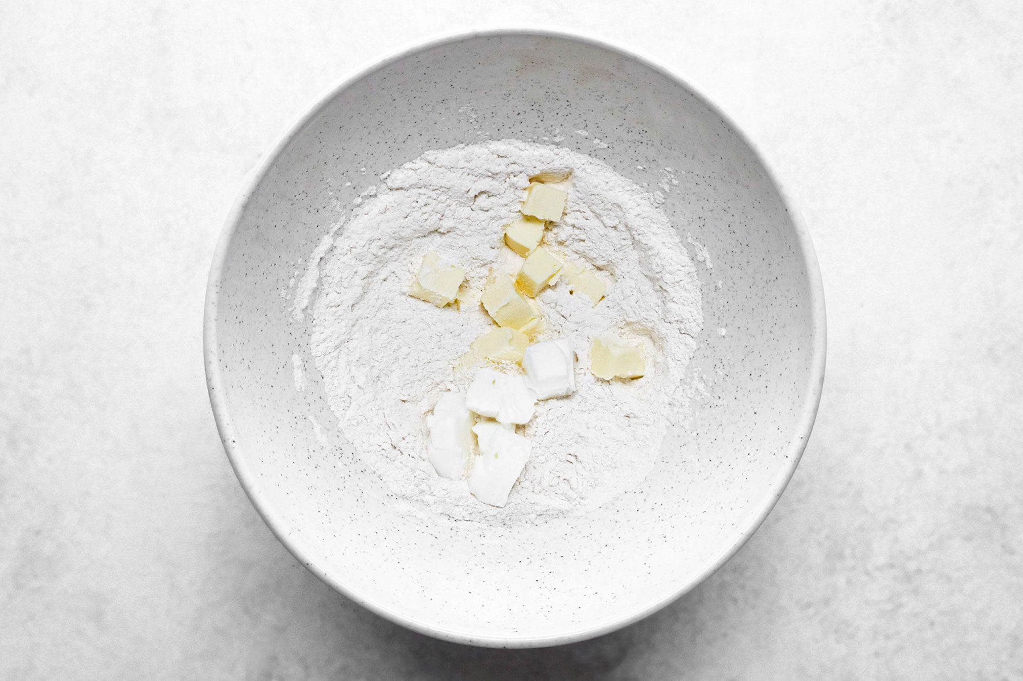 Add butter in salt and flour mix until crumbly