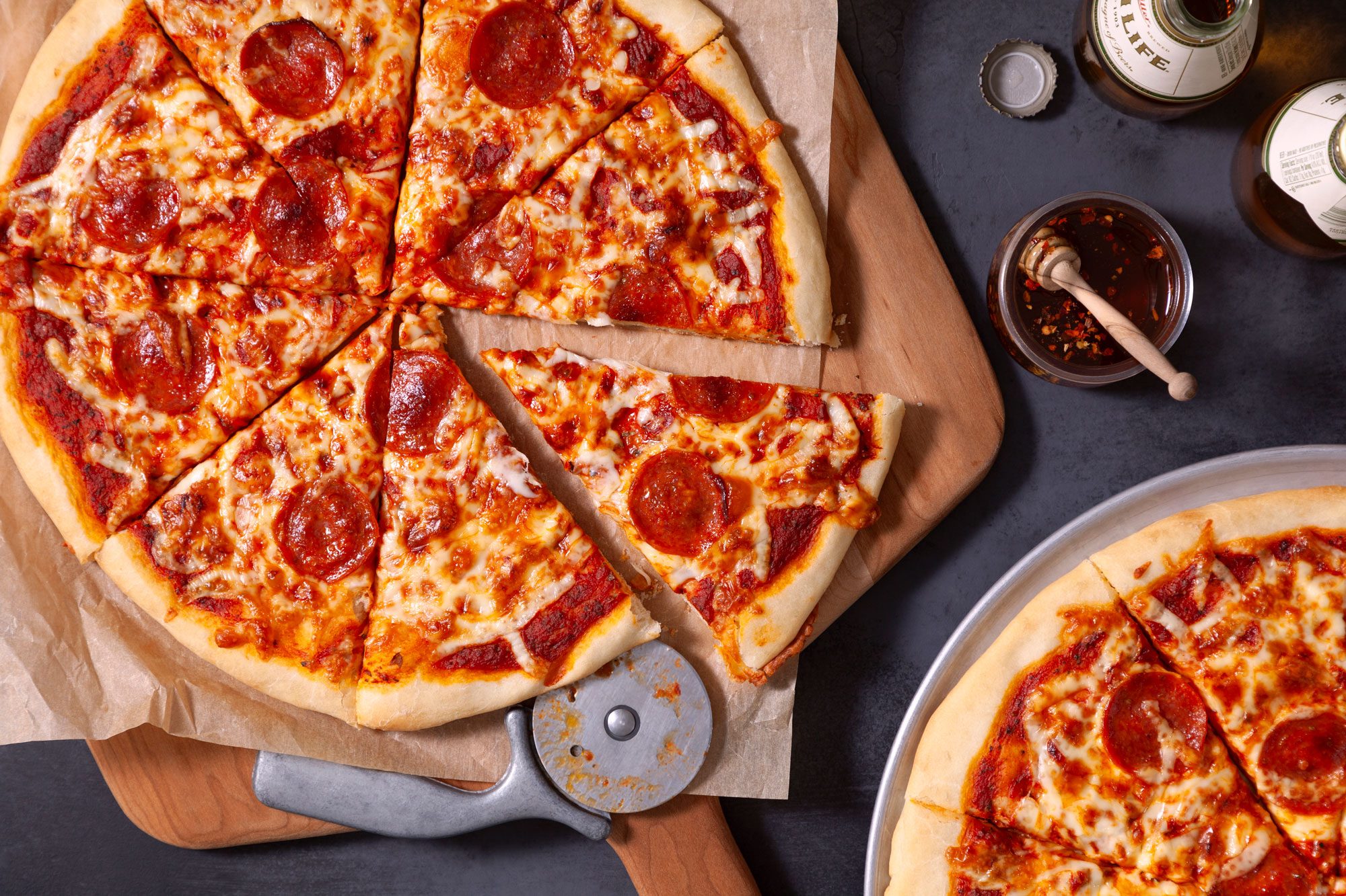 Homemade Pizza on a wooden pizza server