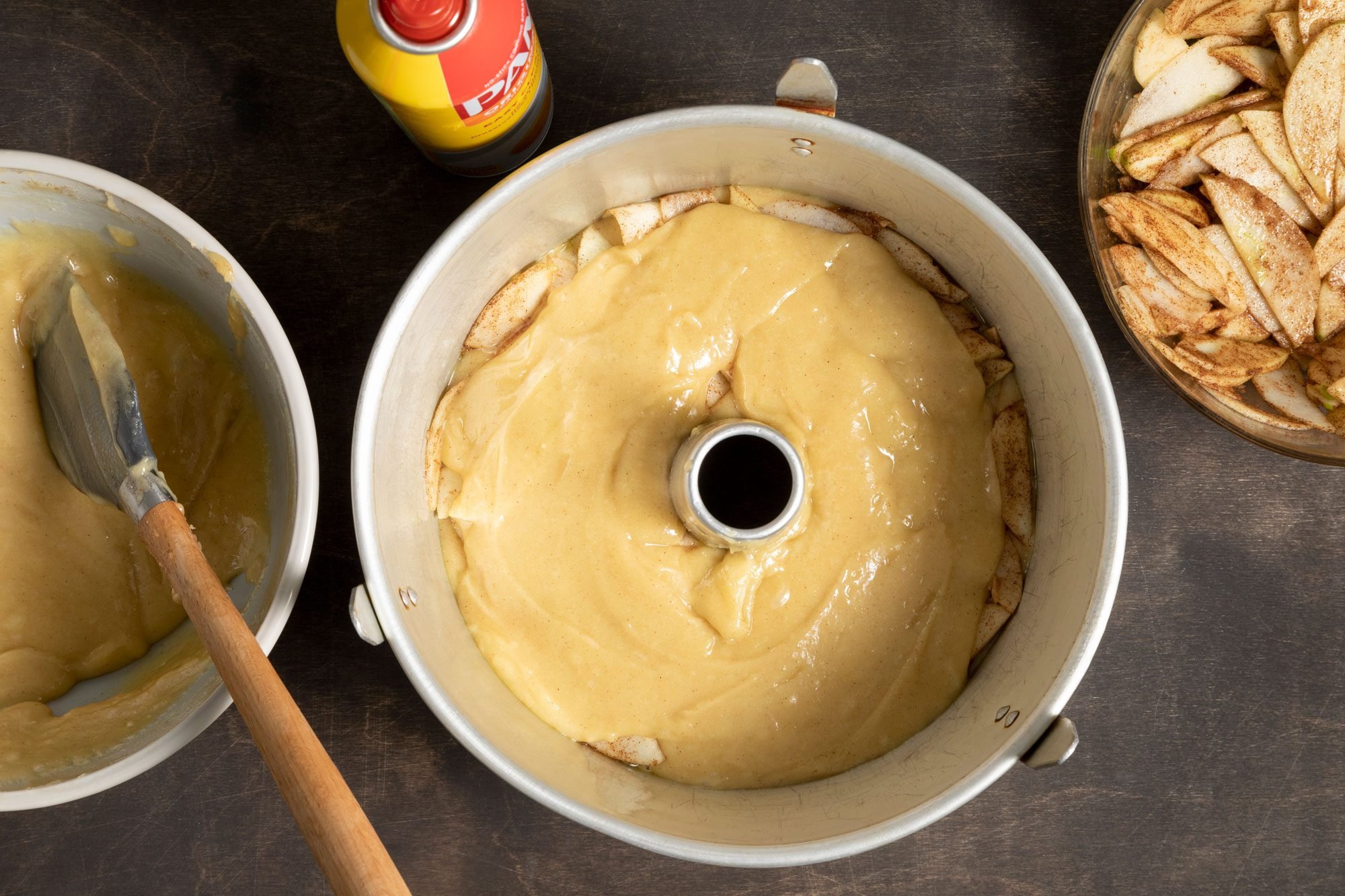 Spread a third of the batter into the pan and half apples, repeat this process again