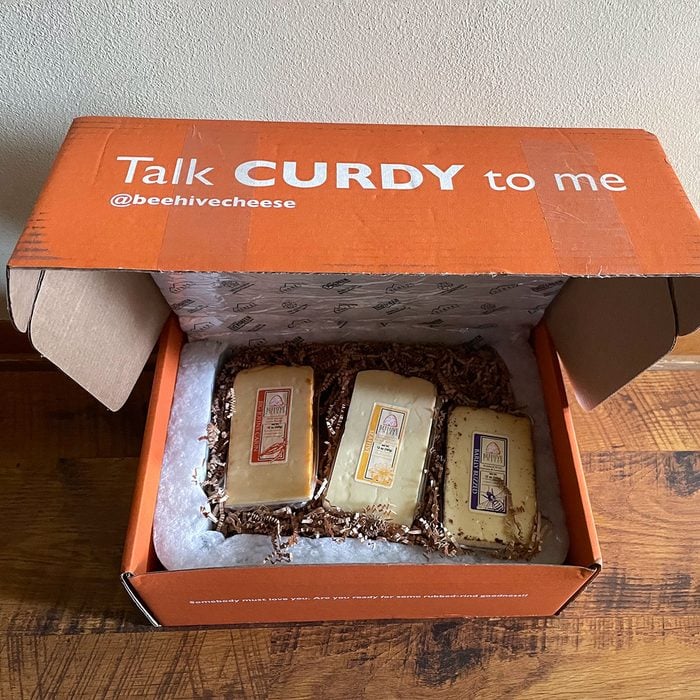 Orange box containing blocks of cheese