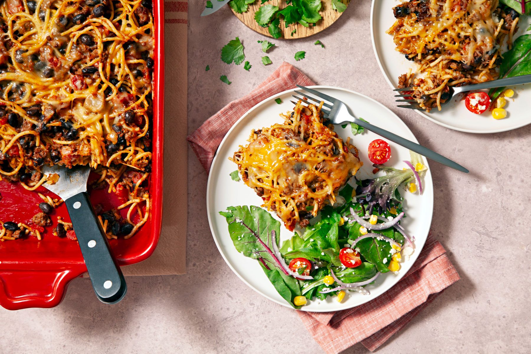 Taco Spaghetti served in a plate with vegetables