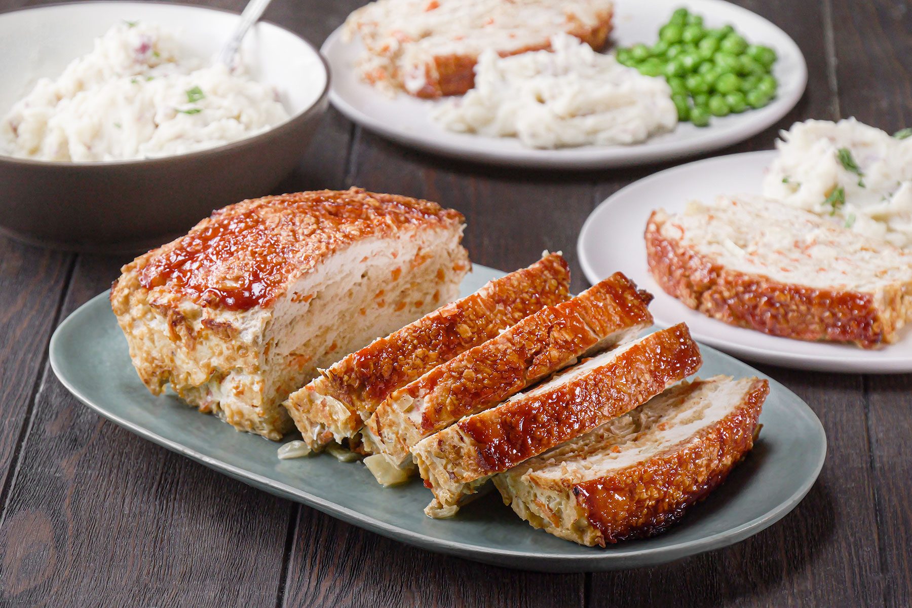 Turkey Meat Loaf served with peas and mashed potato