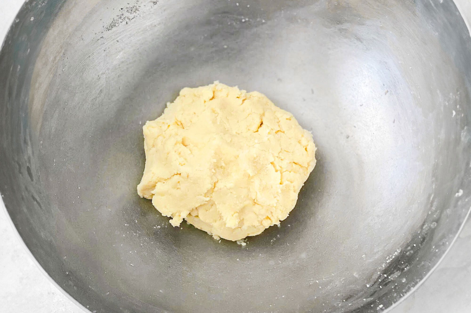 Gulab Jamun Dough in a metal bowl