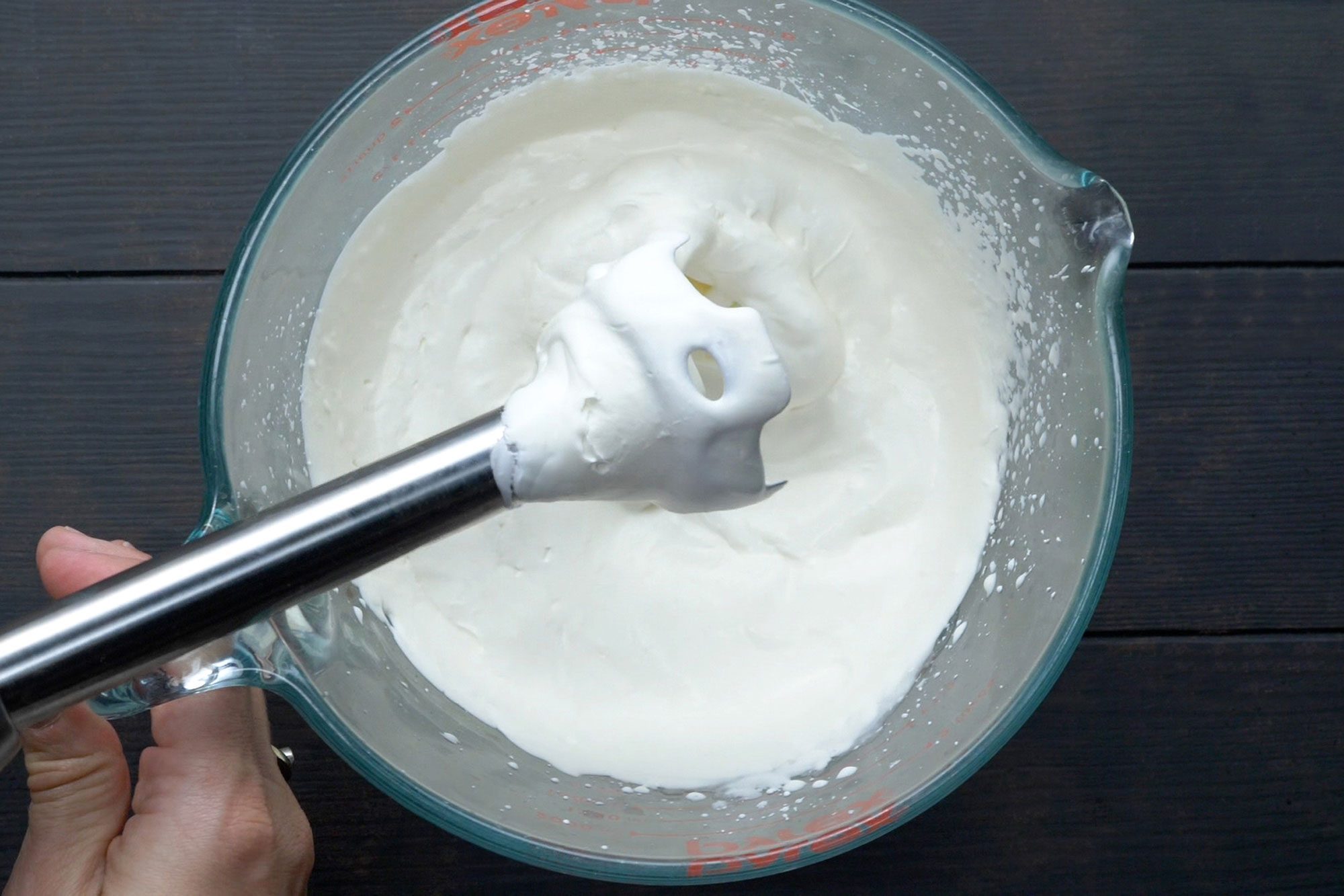 overhead shot of smooth egg mix with blender