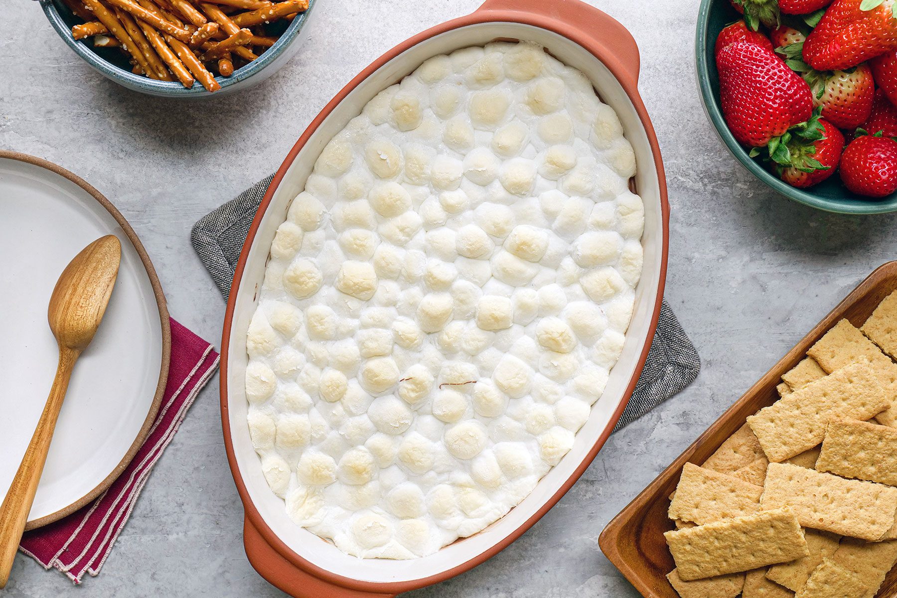 Baked S'mores served in baking dish with crackers