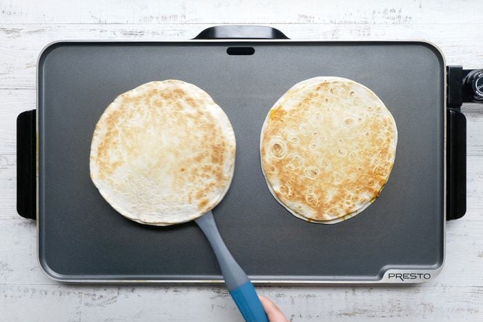 overhead shot of cooking tortillas each sides