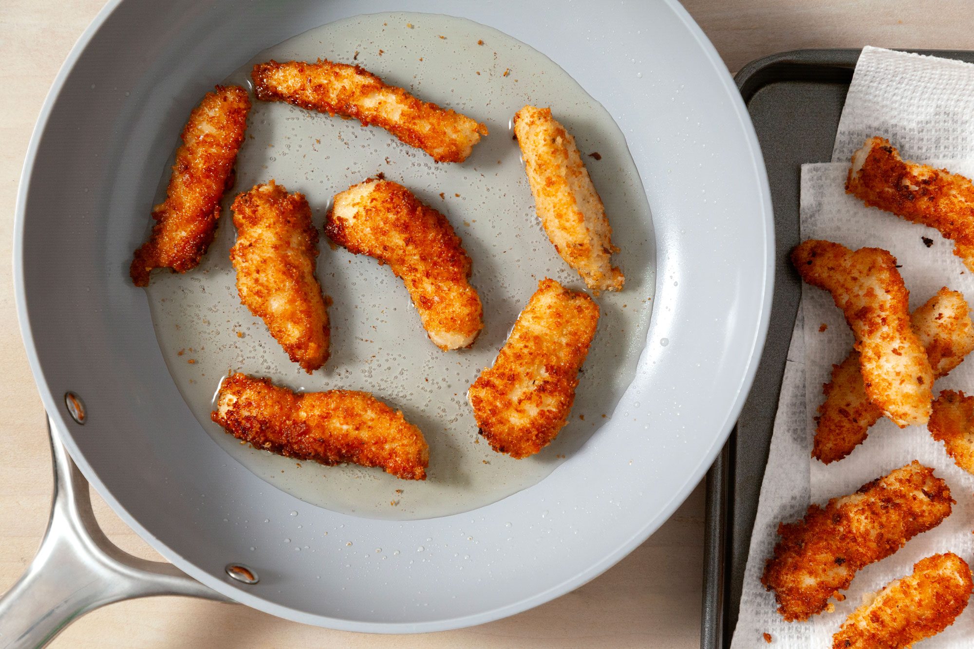 Cook chicken in batches until they’re golden brown in a medium skillet