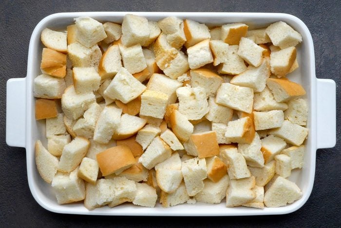 A baking dish of French bread cubes