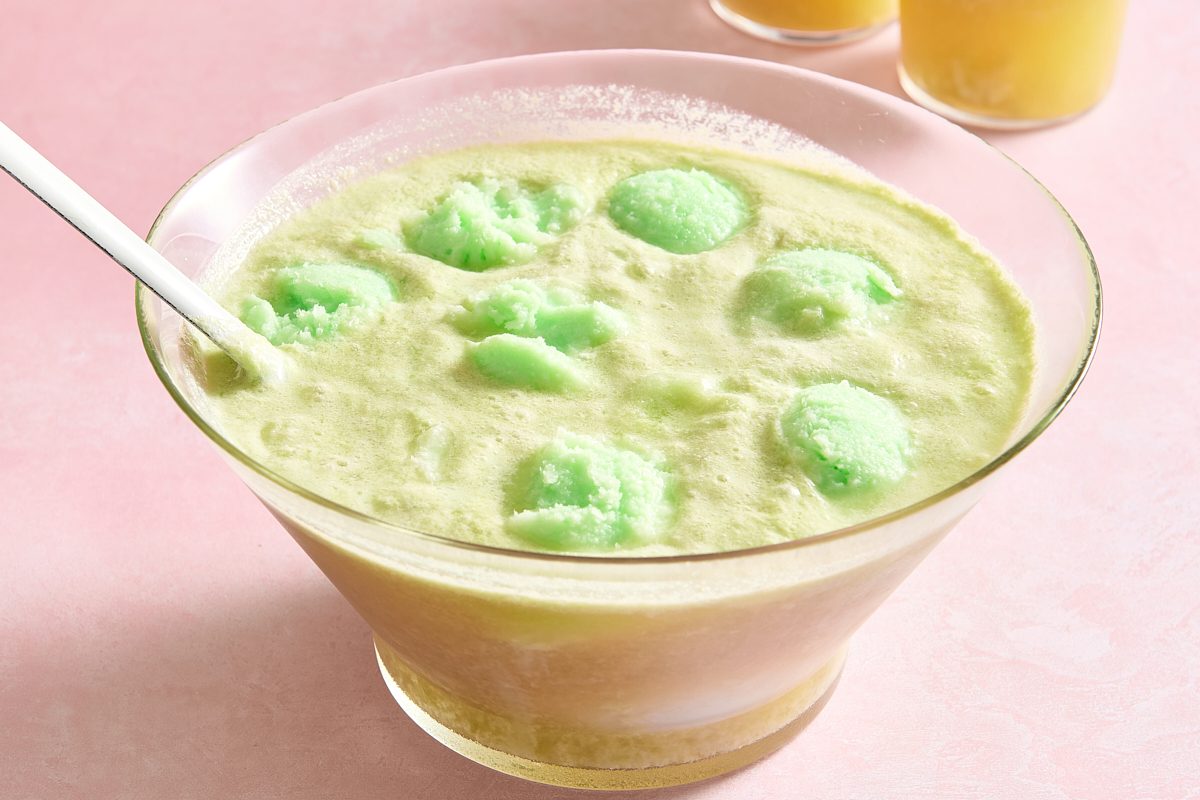 Closeup of lime sherbet punch with scoops of lime sherbet floating on top