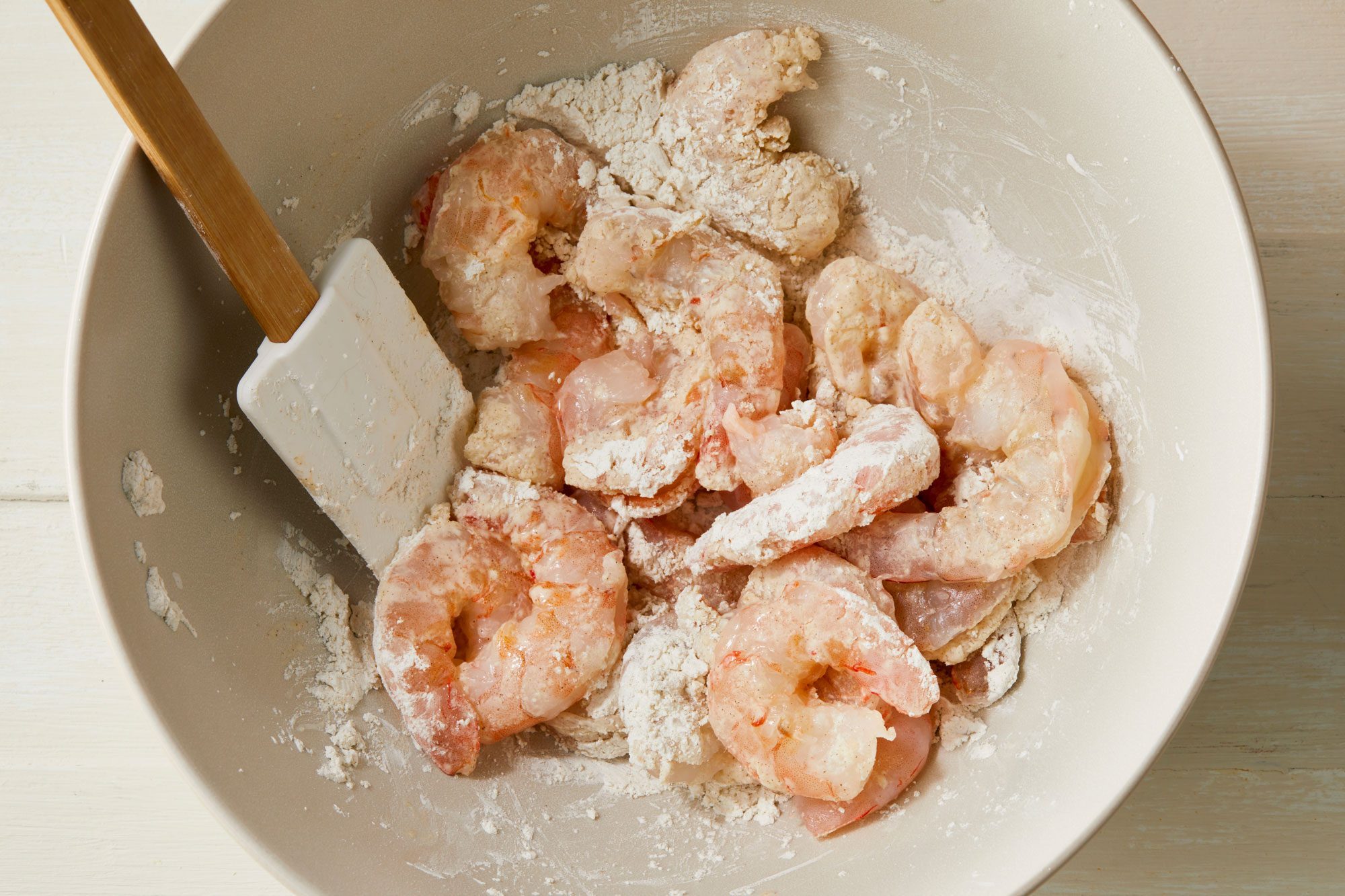 Toss the shrimp in the cornstarch mixture and coat well
