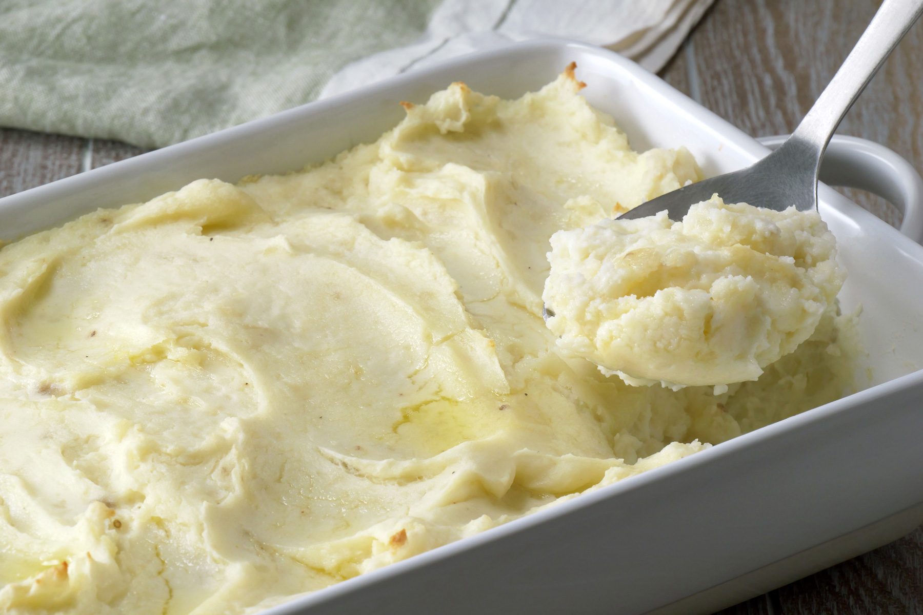 Sour Cream Mashed Potato scooped in a spoon