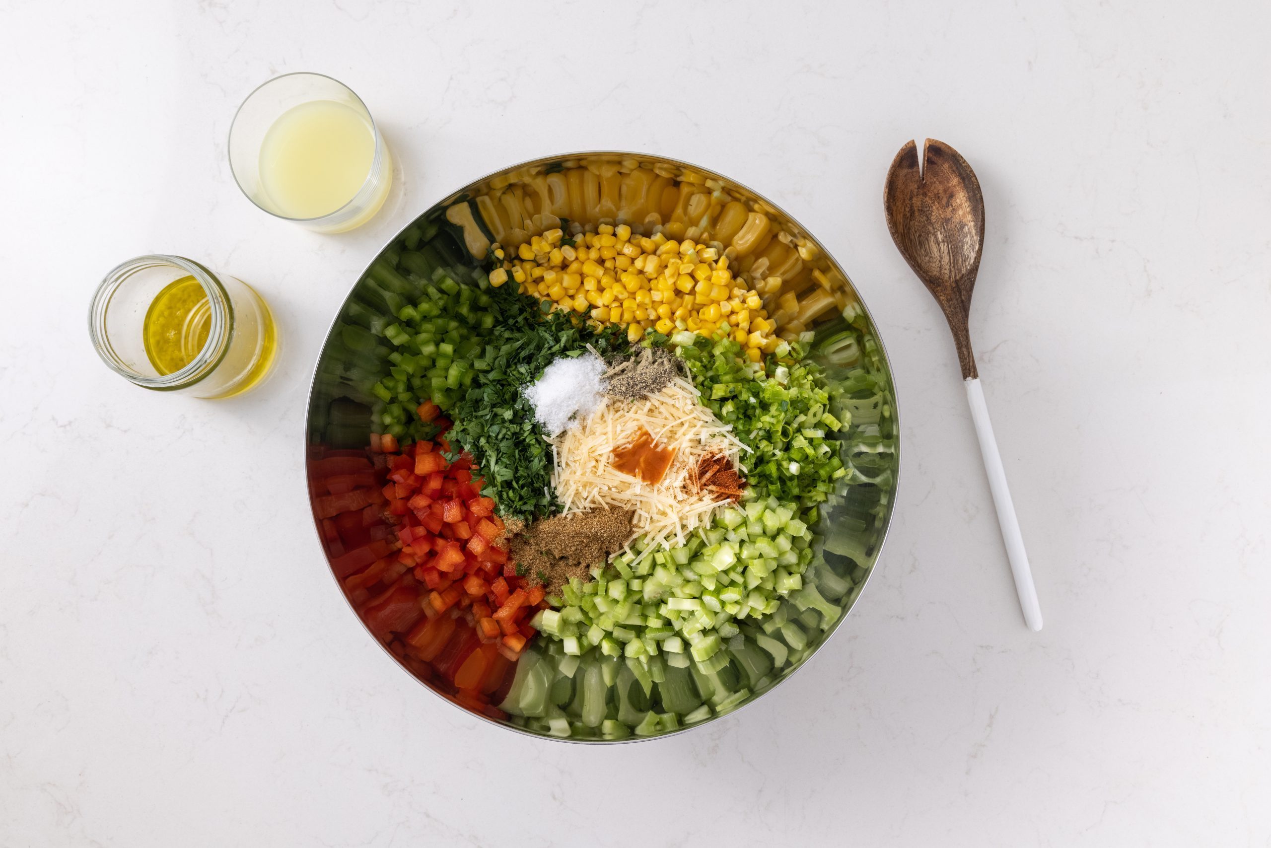Ingredients for the salad combined in bowl.