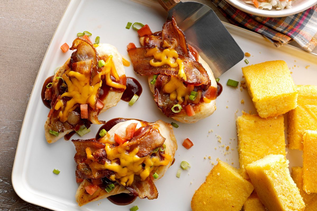 Monterey Chicken on a tray served with corn bread