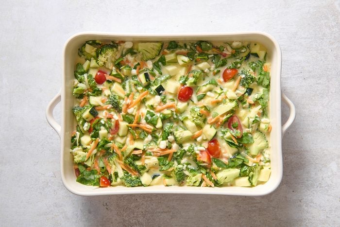 Casserole poured into a baking dish ready for the oven