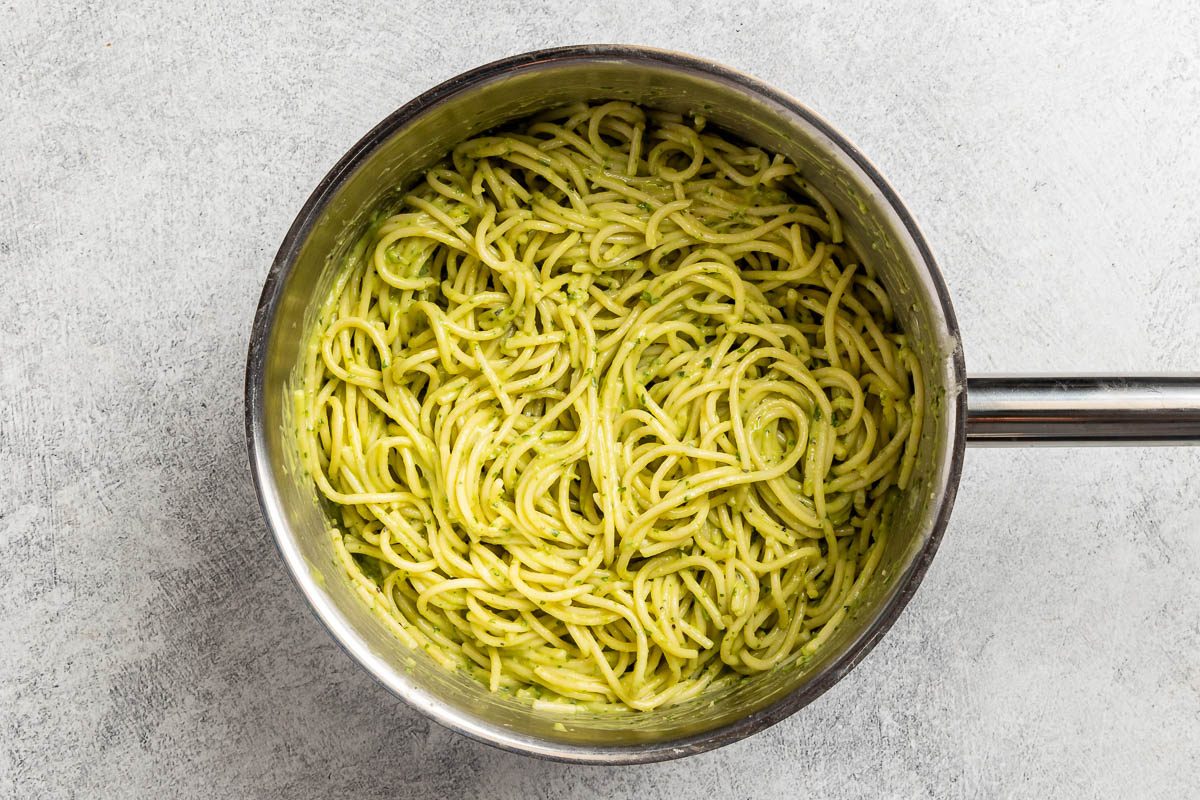 Taste of Home Avocado Pesto recipe photo of the pasta and pesto combined in the saucepan.