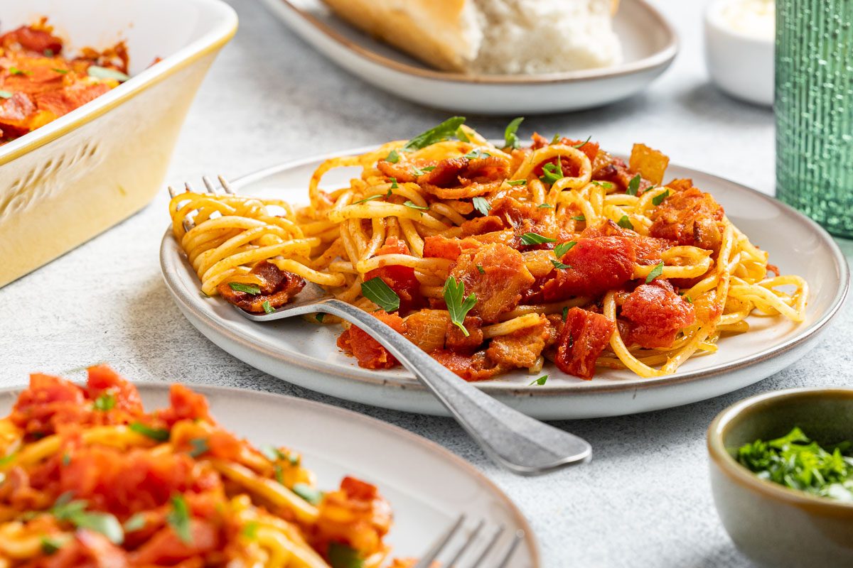 Taste of Home Bacon Pasta recipe photo of the finished recipe served on plates.