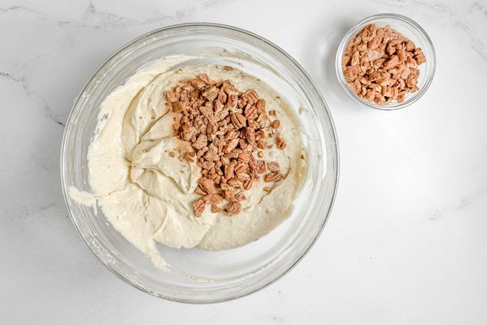 Batter and topping for Taste of Home Banana Coffee Cake in glass bowls on a marble surface