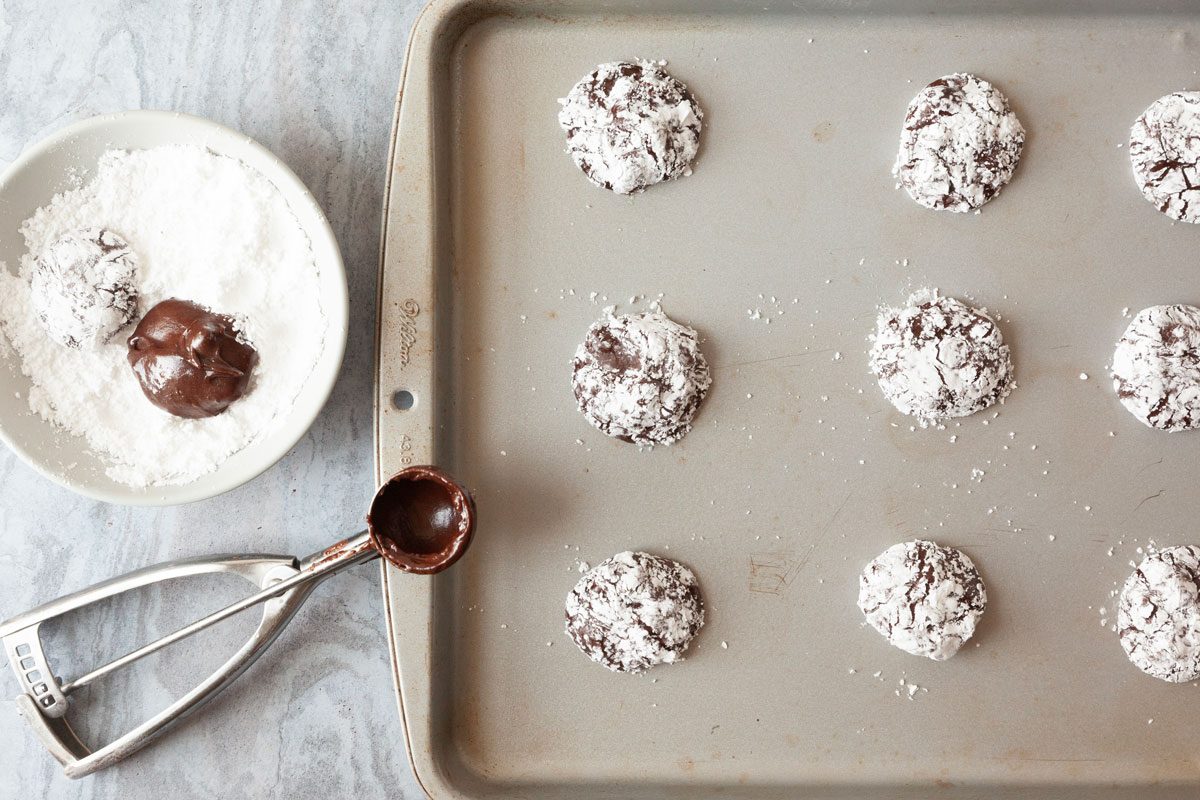 Step 2 of Taste of Home Brownie Mix Cookies is to Place the confectioners' sugar in a shallow dish. Drop the dough by tablespoonfuls into the sugar then gently roll to coat them. Place the cookie balls 2 in. apart on greased baking sheets.