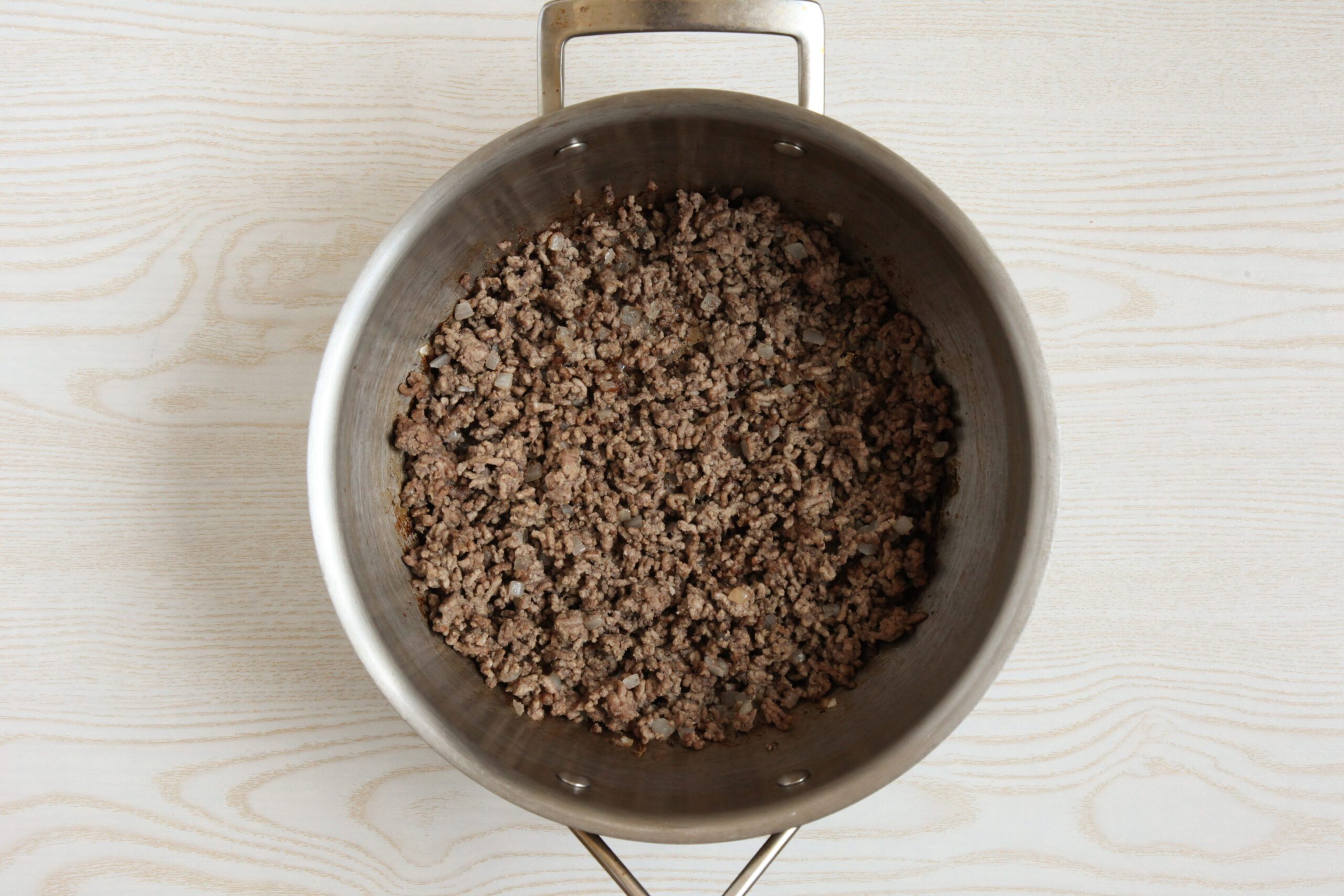 Browning ground beef and onions