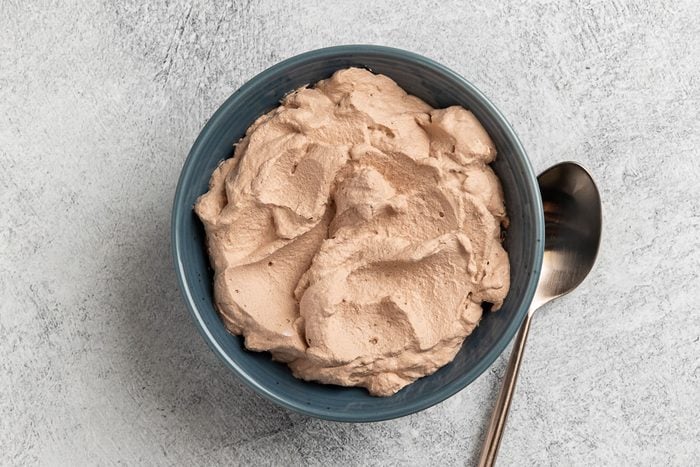 Taste of Home photo Coffee Whipped Cream recipe photo of the finished recipe in a serving bowl.