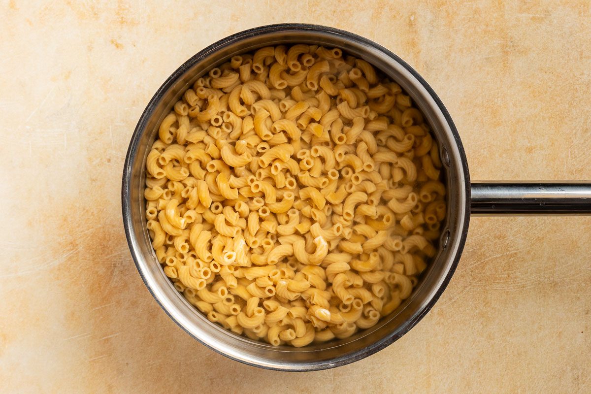 Taste of Home Crab Mac and Cheese recipe photo of the macaroni cooked in a saucepan.
