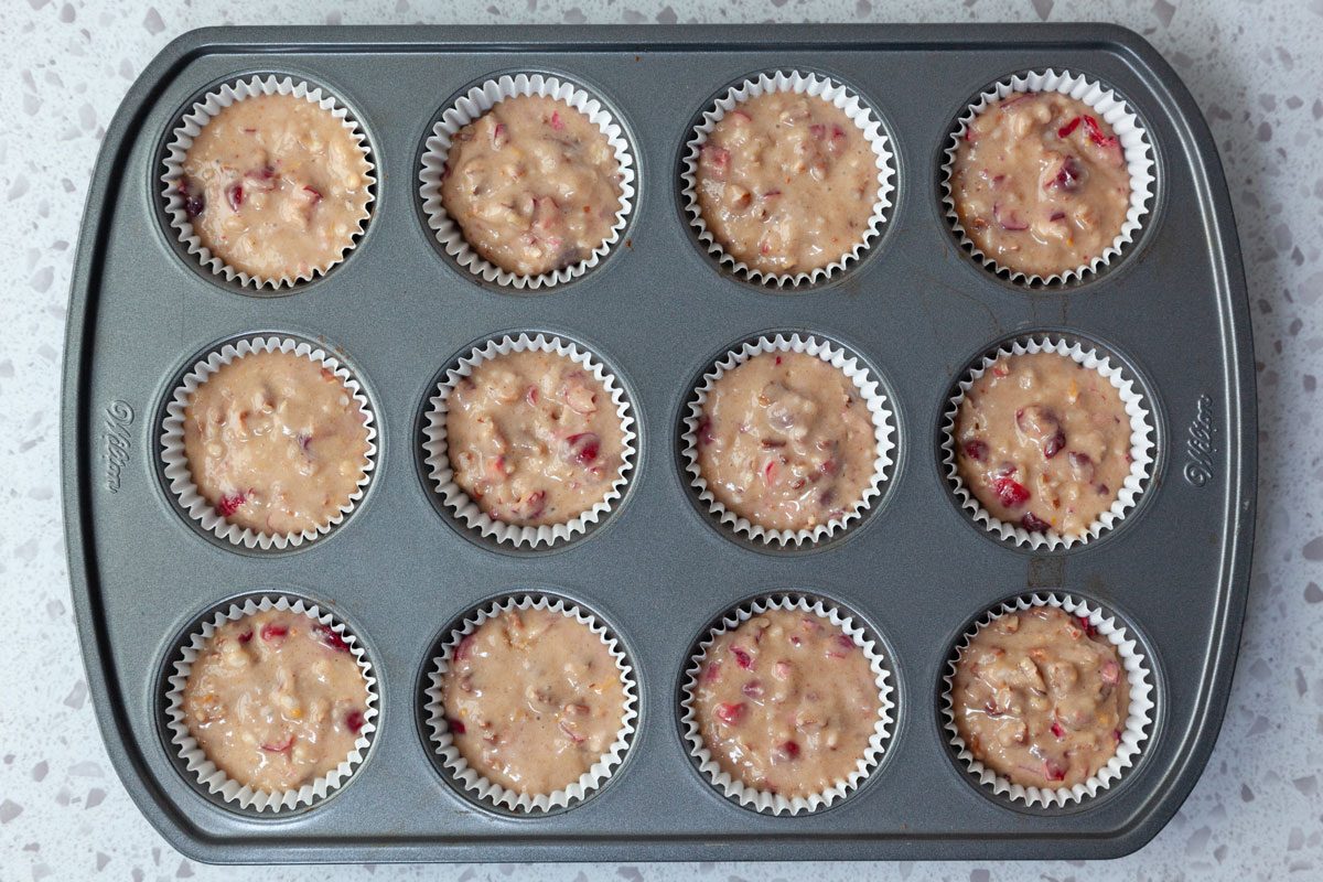 Step 5 of Taste of Home Cranberry Muffins is to bake the muffins