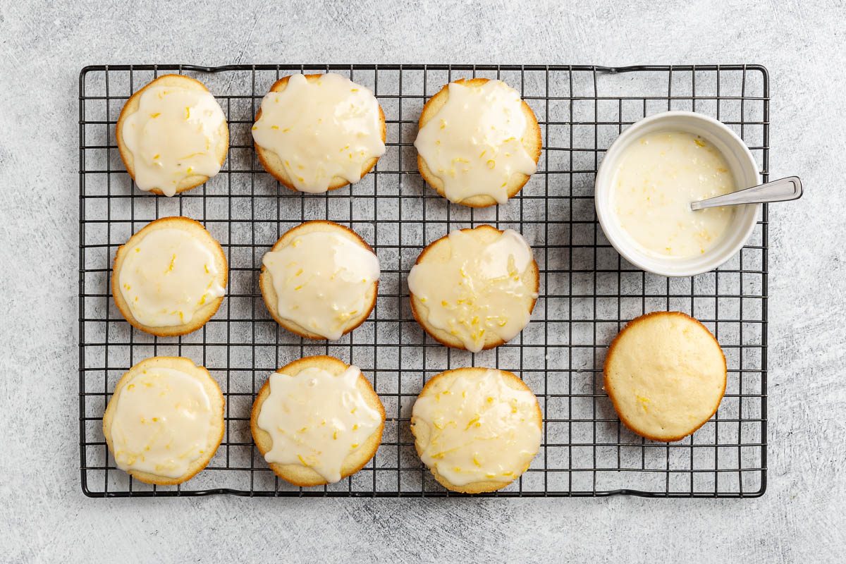 Taste of Home Lemon Ricotta Cookies photo of frosting the cookies.