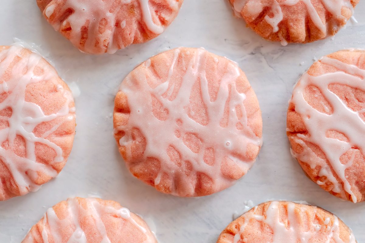 Pretty pink, jelly filled, strawberry sandwich cookies with step-by-step instructions from Taste of Home.