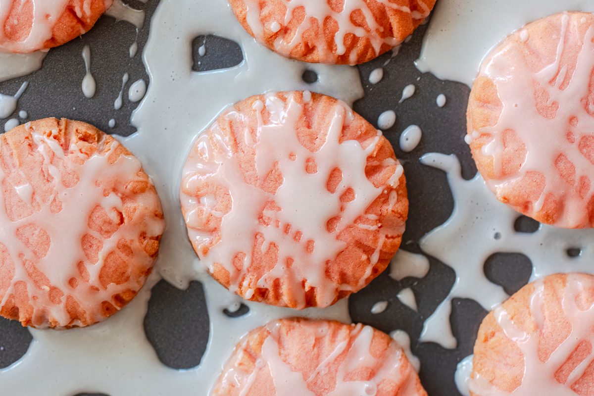 Pretty pink, jelly filled, strawberry sandwich cookies with step-by-step instructions from Taste of Home.