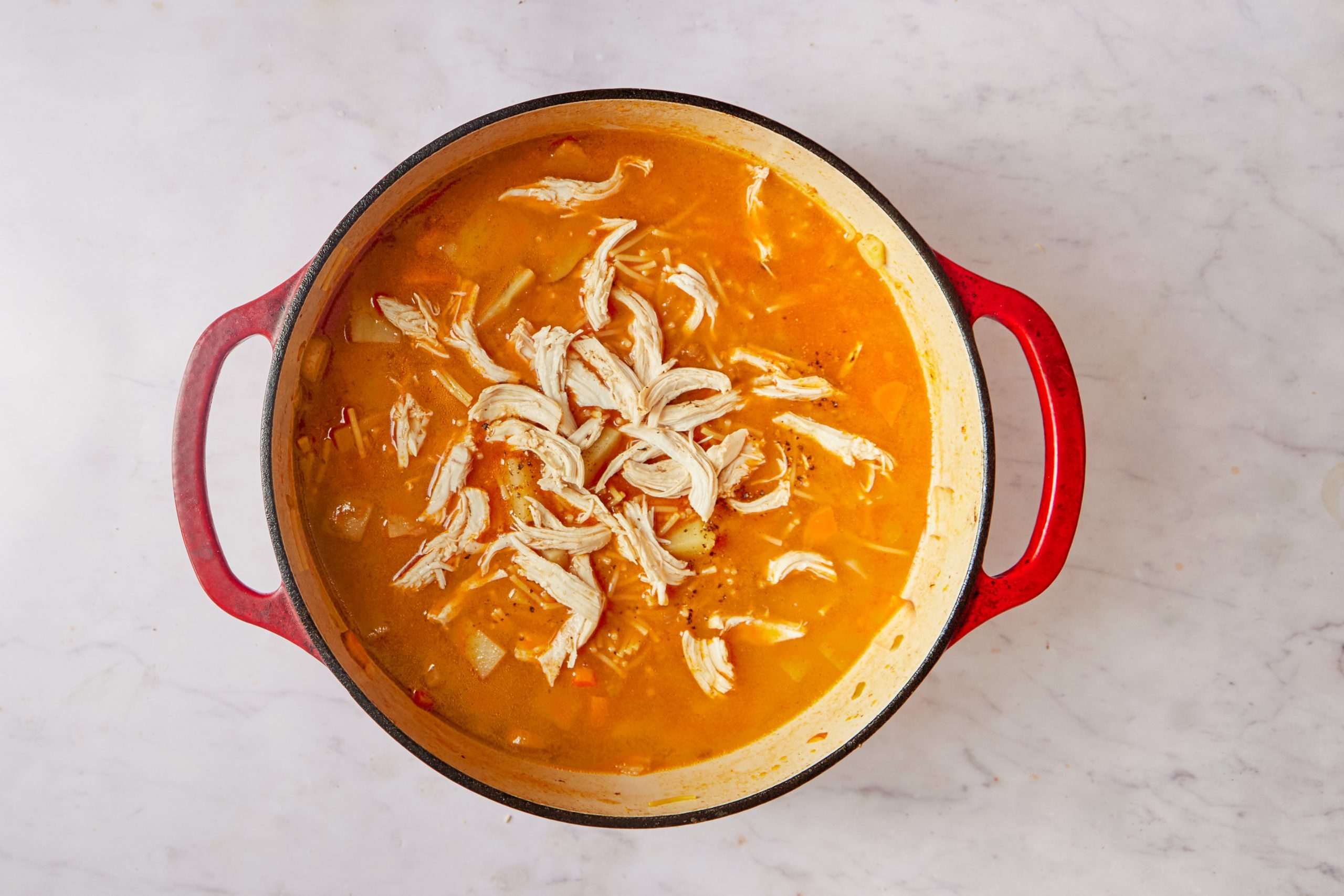 Finish the Spanish chicken soup.