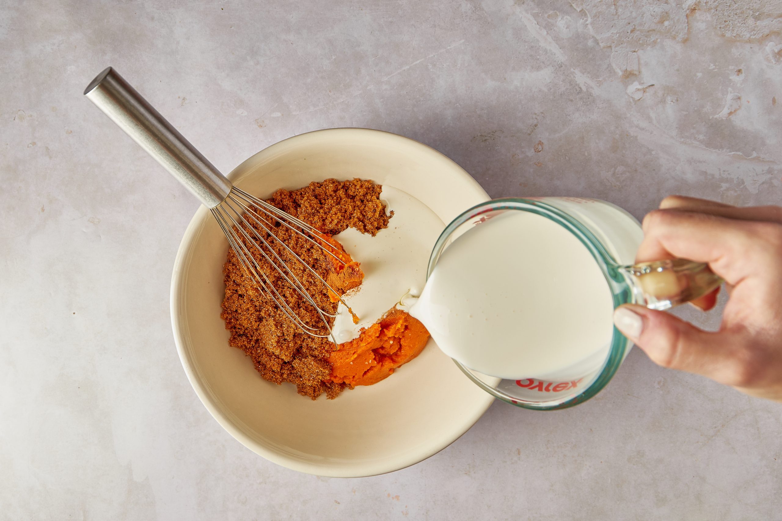 Combine the ingredients for pumpkin ice cream.