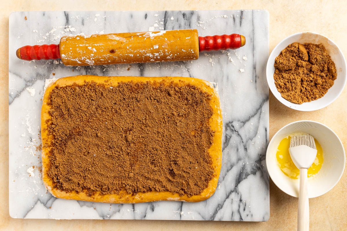 Taste of Home Pumpkin Cinnamon Rolls recipe photo of shaping and filling the rolls.